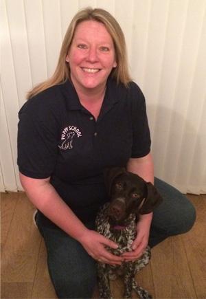 Qualified Puppy School trainer Tammy beaming with pride